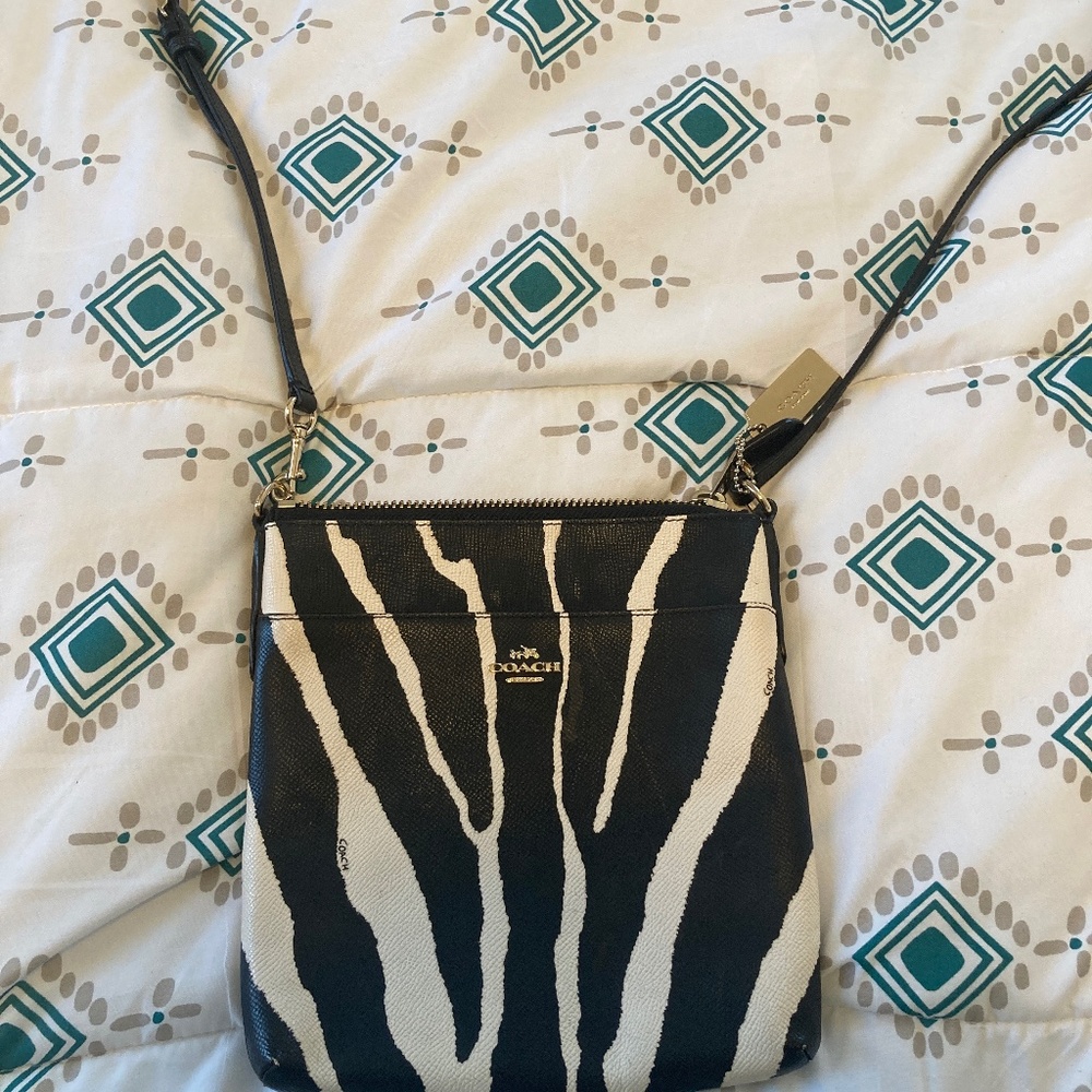 Zebra print coach crossbody bag